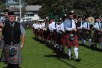 Otahuhu Pipe band playing in massed bands at three kings highland games